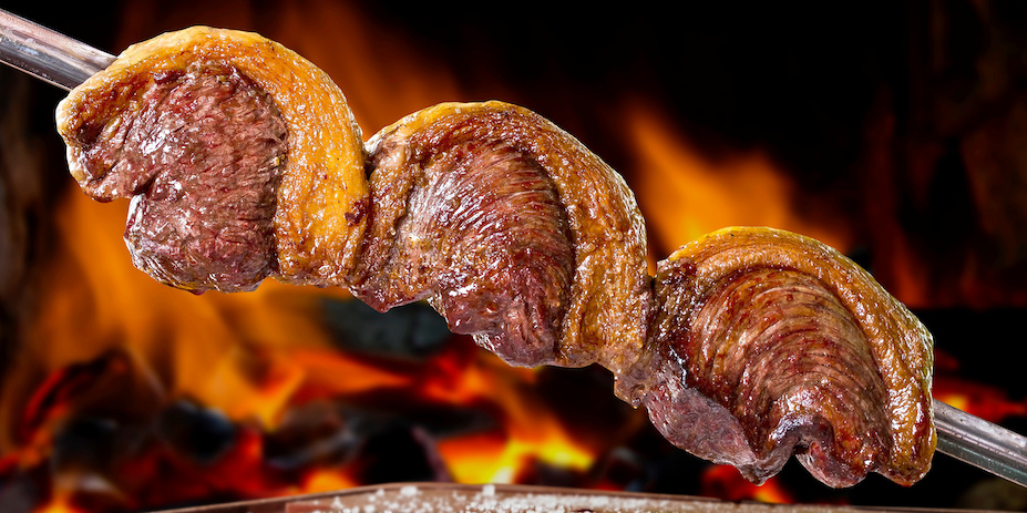 Grilled rump cap (picanha) on a skewer